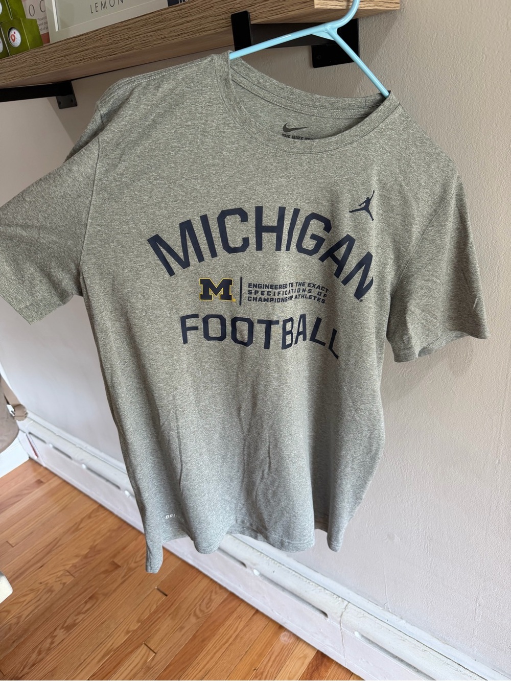 Nike Gray Michigan Football Short Sleeve Tee with Navy & Maize Logo